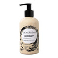 absolution La Crème Douce Démaquillante – cremefarbene Flasche 285ml mit schwarzer Pumpe, weißem Hintergrund – Make-up-Entferner