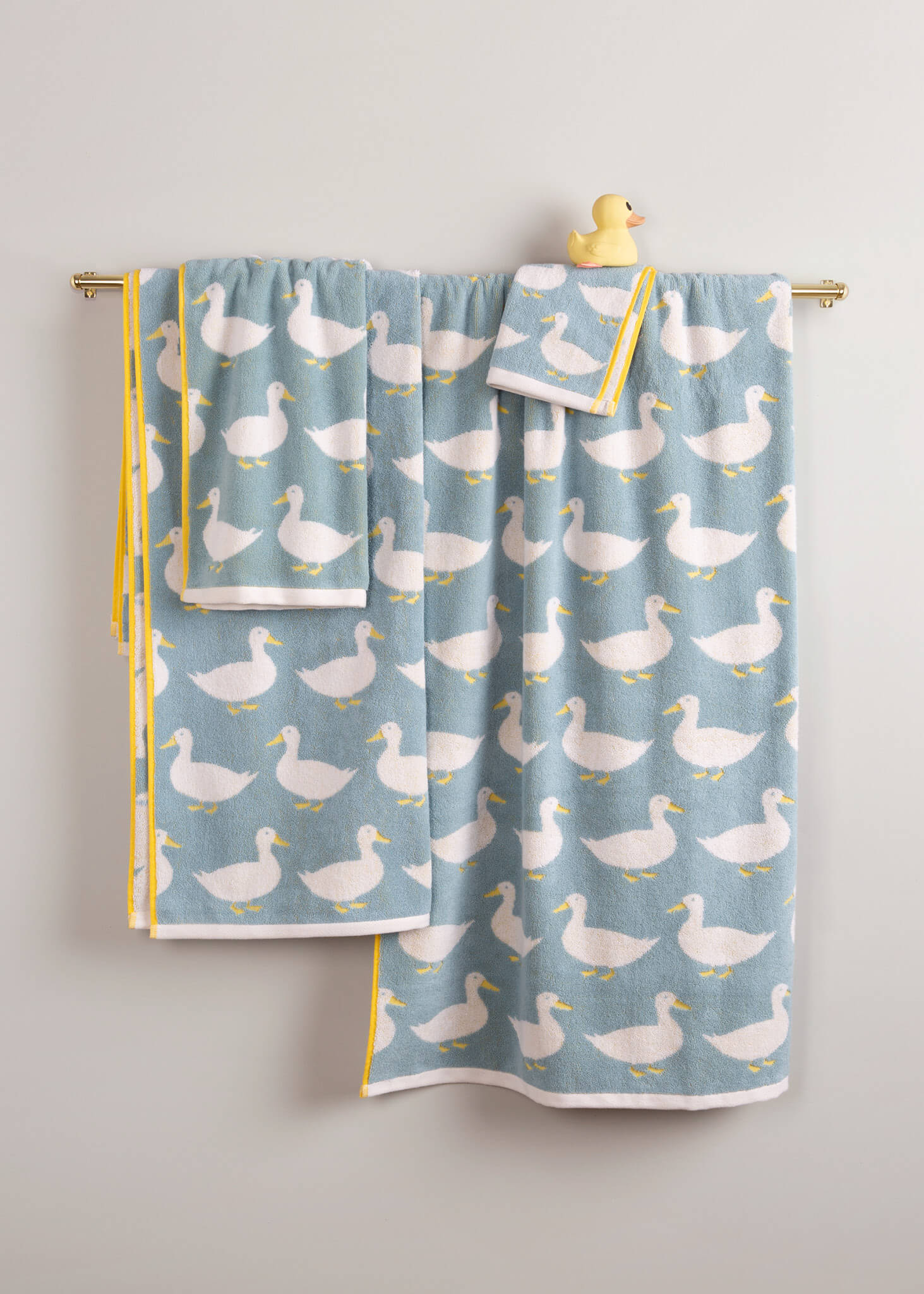 Waddling Ducks Organic Cotton Towels – light blue with white ducks, yellow border, cream background – bath towel