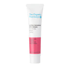 The Organic Pharmacy Ultra Calming Eye Cream in weißer Tube mit rosa Akzent auf weißem Hintergrund, Hautpflege