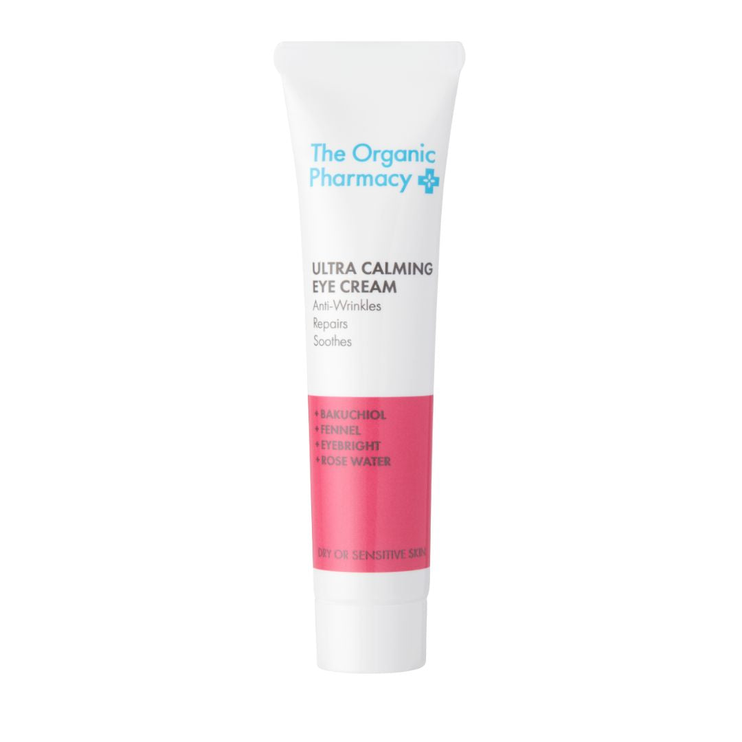 The Organic Pharmacy Ultra Calming Eye Cream in weißer Tube mit rosa Akzent auf weißem Hintergrund, Hautpflege
