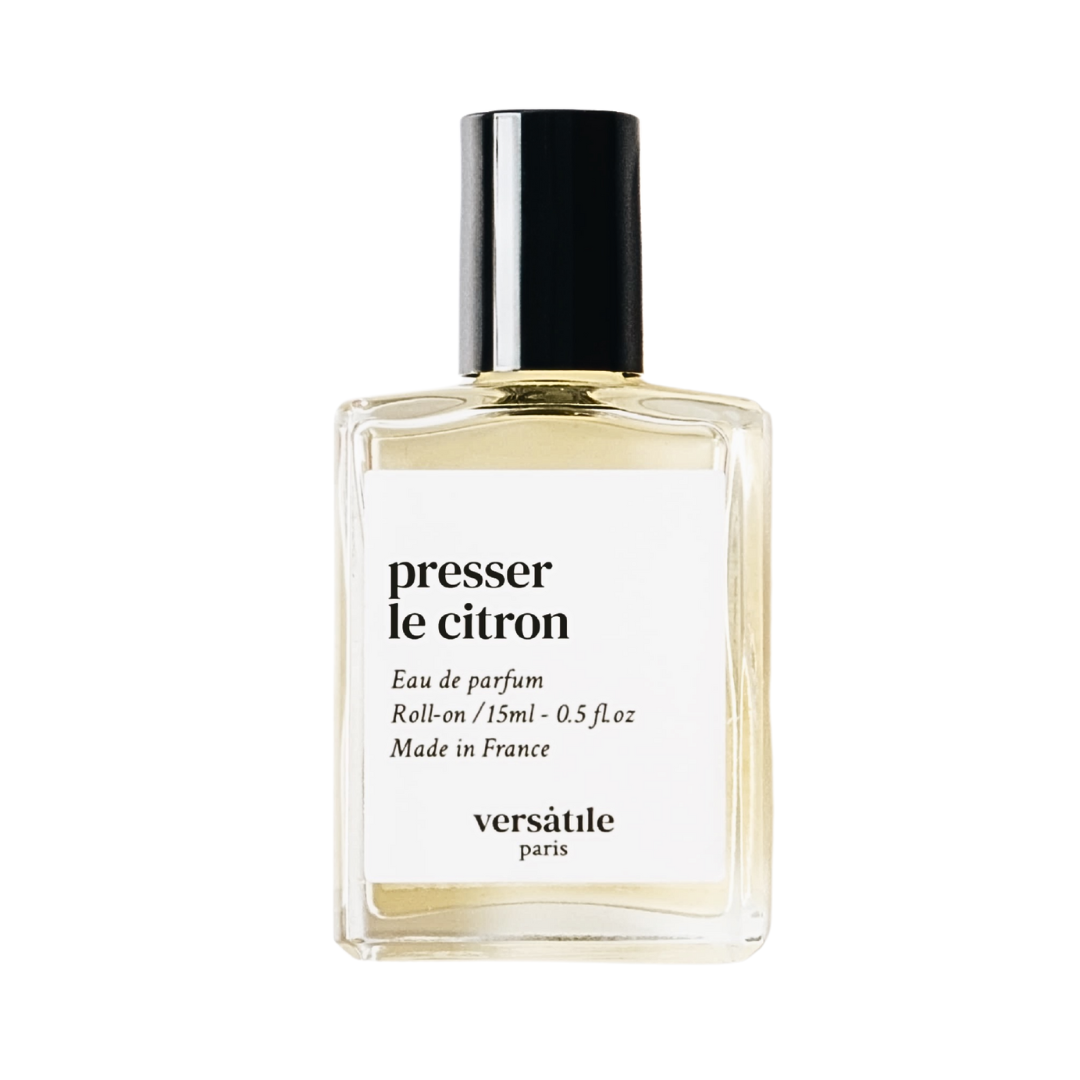 Presser Le Citron Roll-on Parfümöl in einer Glasflasche mit schwarzem Verschluss, 15ml, auf weißem Grund, Duftöl.