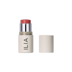 ILIA Multi-Stick in beiger Tube mit rotem Stift auf weißem Hintergrund, Make-up