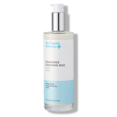 The Organic Pharmacy Chamomile Cleansing Milk in a bottle with pump on a white background, skin care