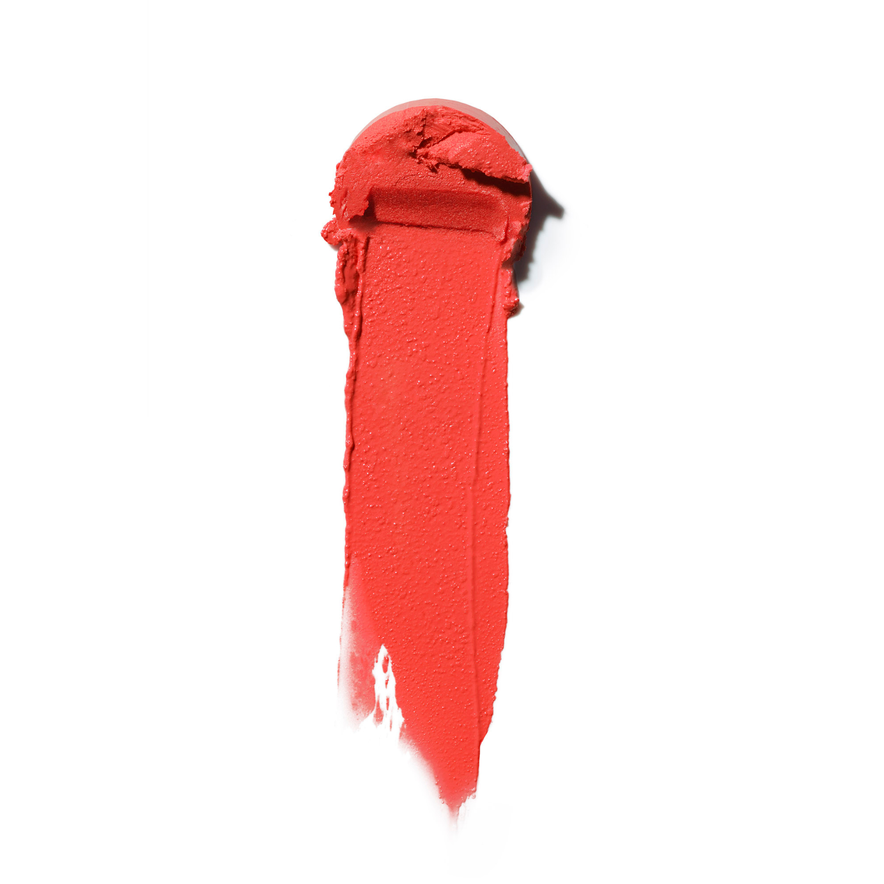 Roter Farbaustrich des Multi-stick auf weißem Hintergrund für ein natürliches Make-up