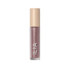 ILIA Liquid Powder Chromatic Eye Tint in einer Flasche mit beigem Verschluss auf weißem Hintergrund, Augen-Make-up