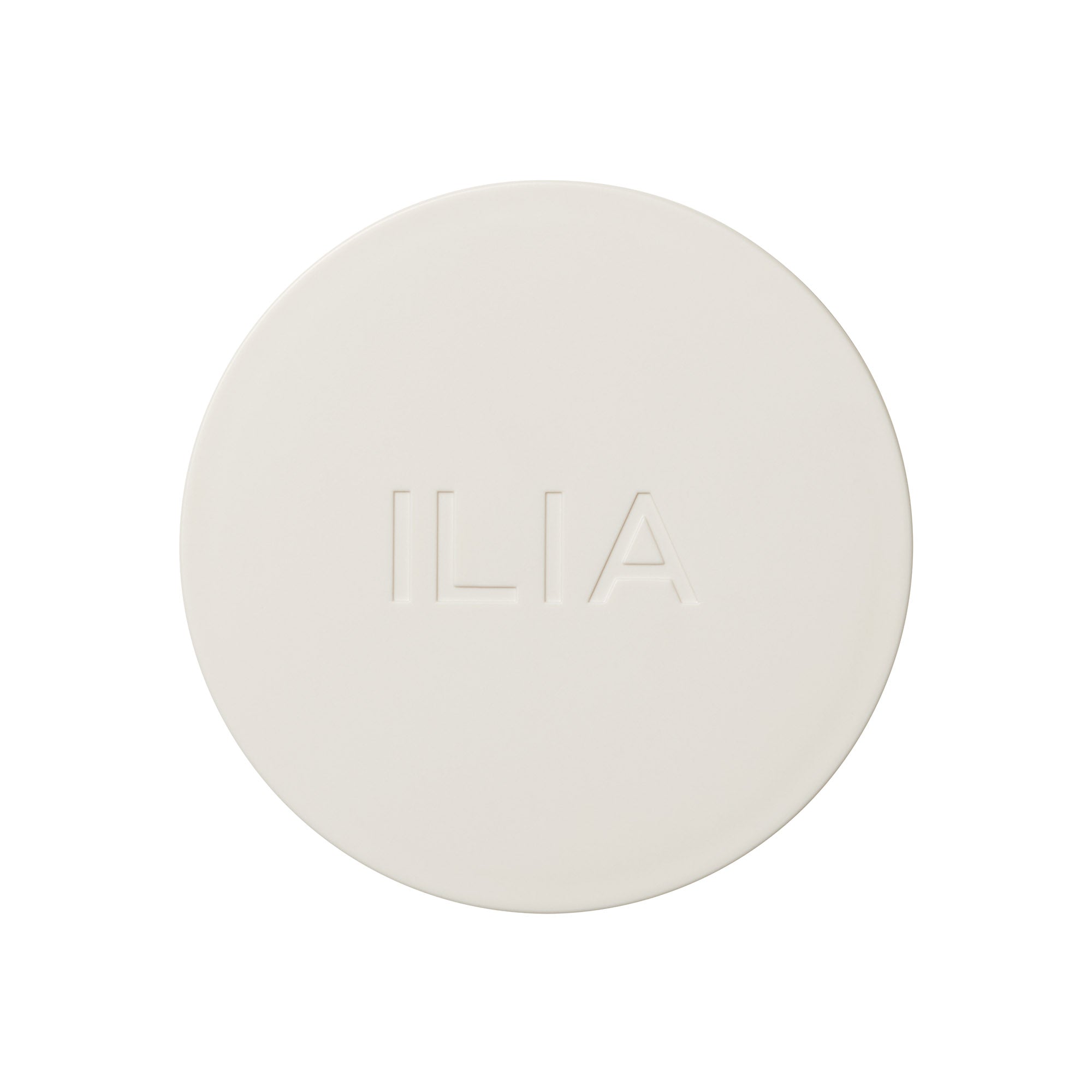 ILIA Soft Focus Finishing Powder in einem cremeweißen Tiegel auf weißem Hintergrund, Make-up Puder