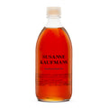 Susanne Kaufmann Hayflower Bath Oil in einer durchsichtigen Glasflasche mit weißem Schraubverschluss, Körperpflege
