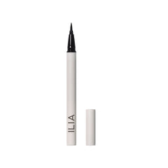 ILIA Clean Liquid Liner Midnight Express, weißer Stift mit schwarzer Spitze auf weißem Hintergrund, Eyeliner