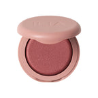 ILIA Soft Focus Blurring Blush in einem rosafarbenen Tiegel auf weißem Hintergrund, Make-up
