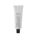 L:A Bruket No. 102 Hand Cream in a white tube with a black screw cap on a white background, skin care