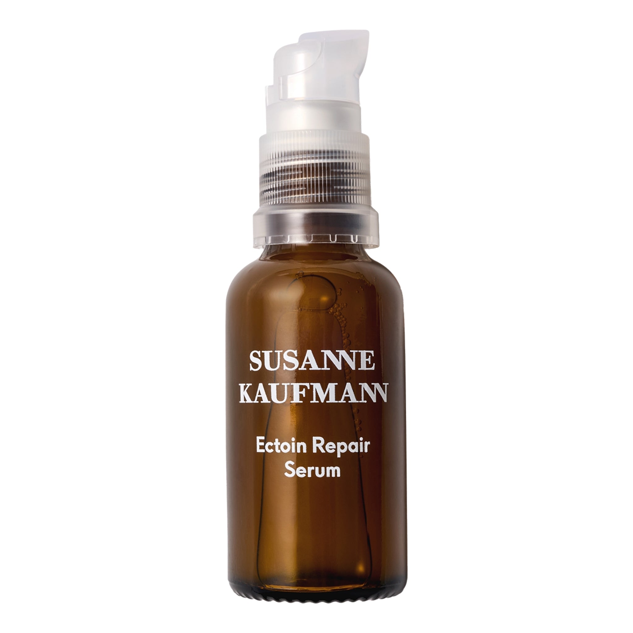 Susanne Kaufmann Ectoin Repair Serum in einer Glasflasche mit weißem Pumpspender auf weißem Grund, Hautpflege