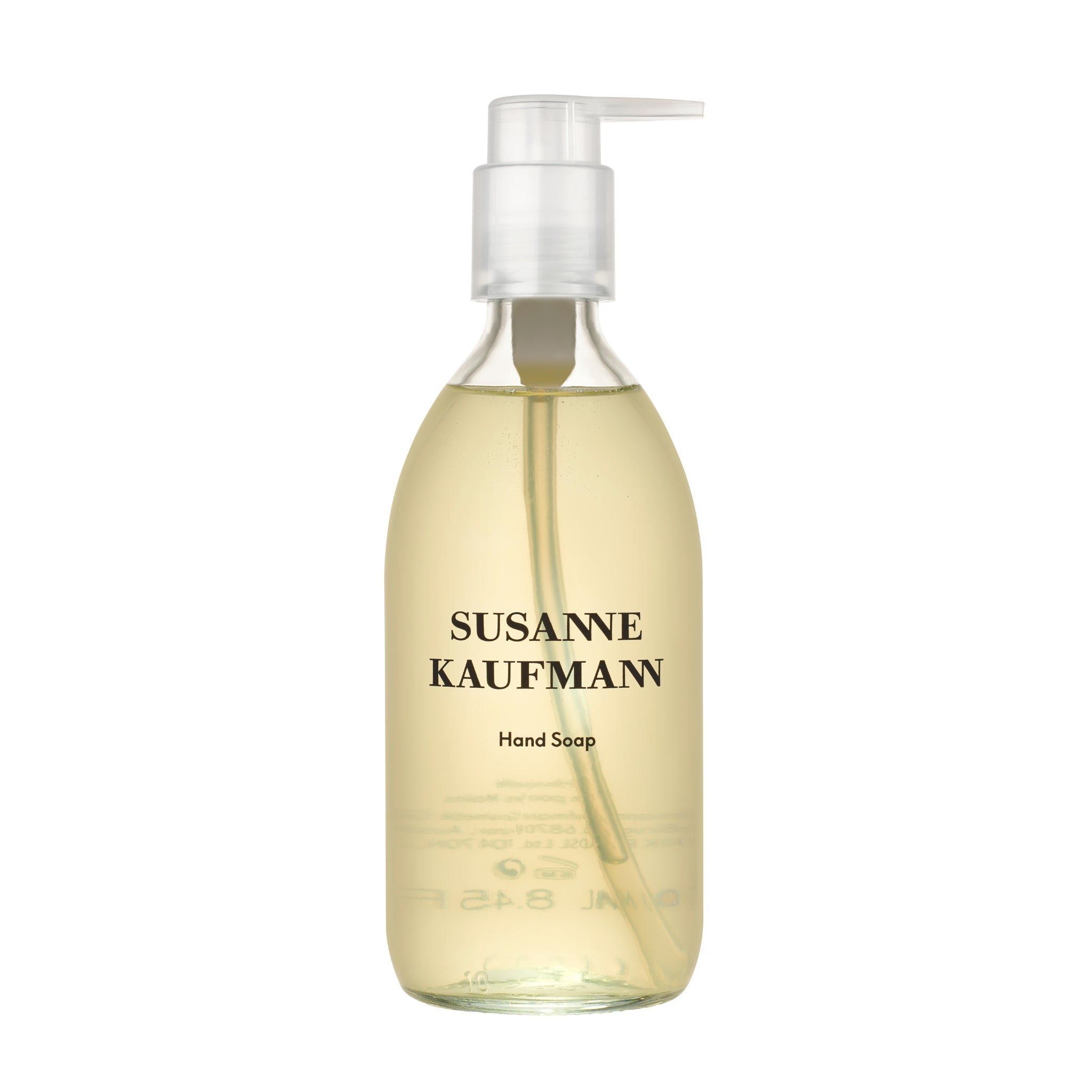 Susanne Kaufmann Handseife in einer durchsichtigen Flasche mit weißem Pumpspender auf weißem Hintergrund, Hautpflege