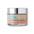 The Organic Pharmacy Vitamin Protection Face Cream im Glas mit Silberdeckel auf weißem Grund, Hautpflege