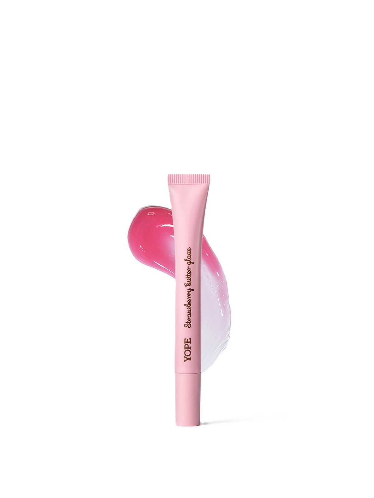 Pink tube of YOPE Strawberry Butter Glaze on a matching product swatch.
