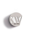 Kjaer Weis Iconic Edition Face Powder – metallic round case, silver, white background – makeup