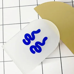 Blue Line packaging – white tube with blue logo, gold background – skin care