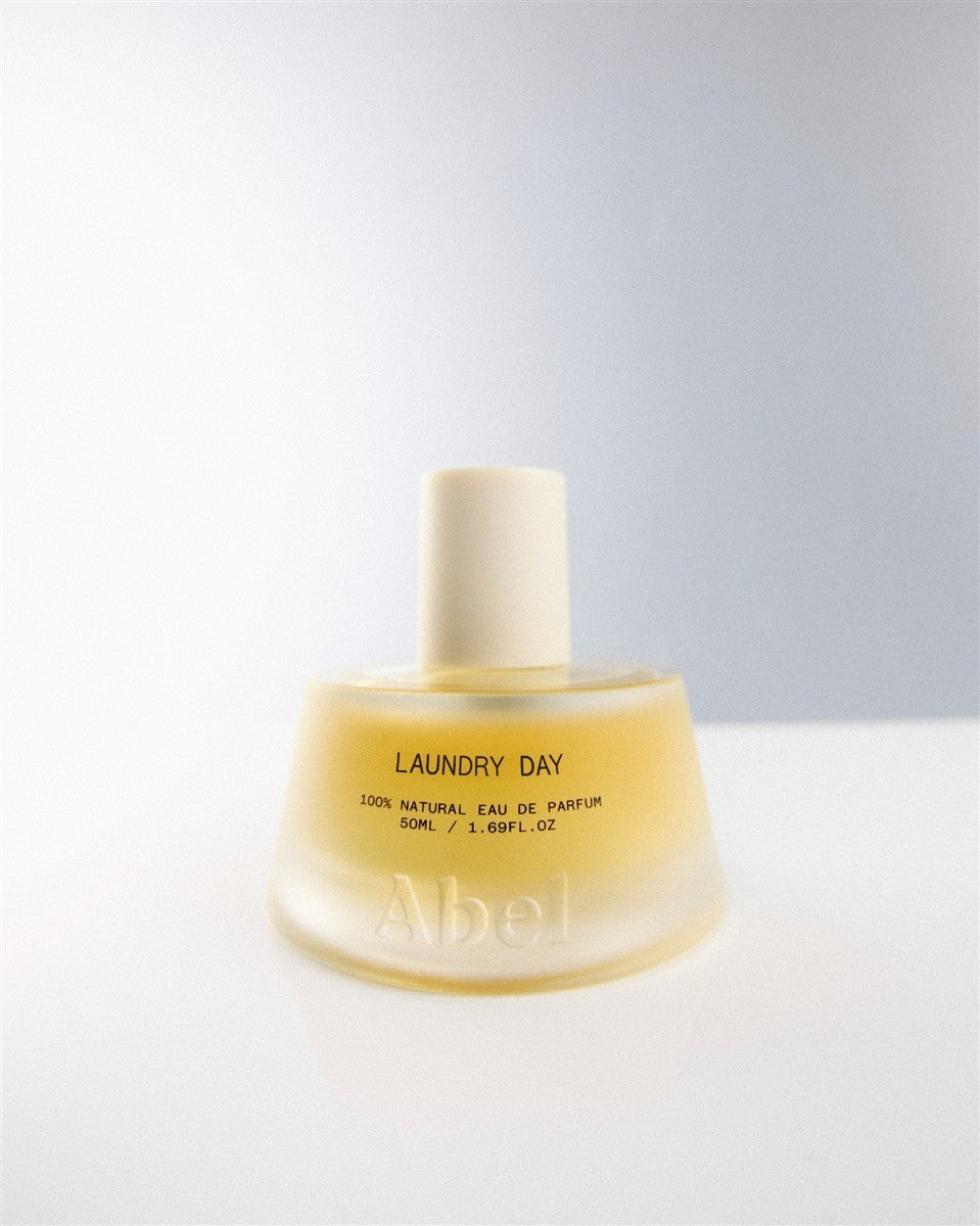 Abel Laundry Day Eau de Parfum – yellow glass bottle 50ml, cream cap, white background – perfume