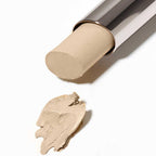 Coverstick 02 Sand – silver tube with sand-colored concealer, white background – makeup