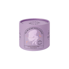 Cosmic Dealer Cacao & Double Rose Ayurvedic Tea – purple cylinder, white background – wellness tea