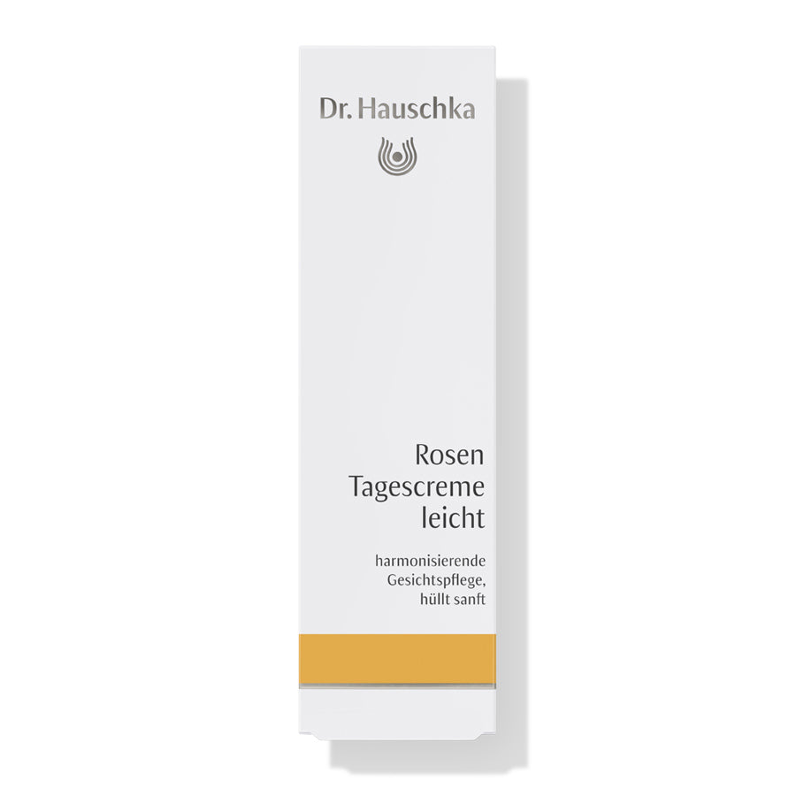 Dr. Hauschka Rosen Day Cream Light – white tube with gold stripe, white background – face care