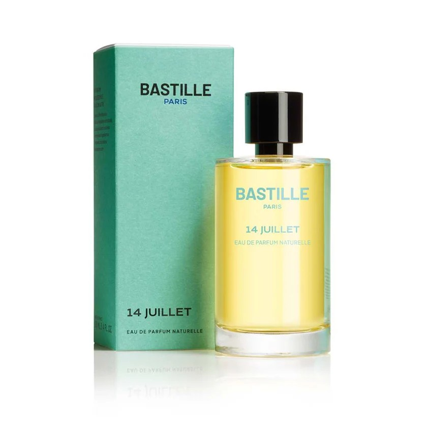 Bastille Paris 14 Juillet Eau de Parfum – gelbe Flasche mit schwarzem Deckel, mintgrüne Verpackung, weißer Hintergrund – Parfüm