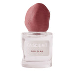 Fascent Red Flag Eau de Parfum – klares Glasfläschchen mit rosafarbenem Stoffverschluss, weißem Etikett, weißem Hintergrund – Parfüm