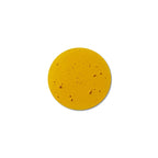 Yellow drop of Antioxidant Face Serum on a white background, skin care.