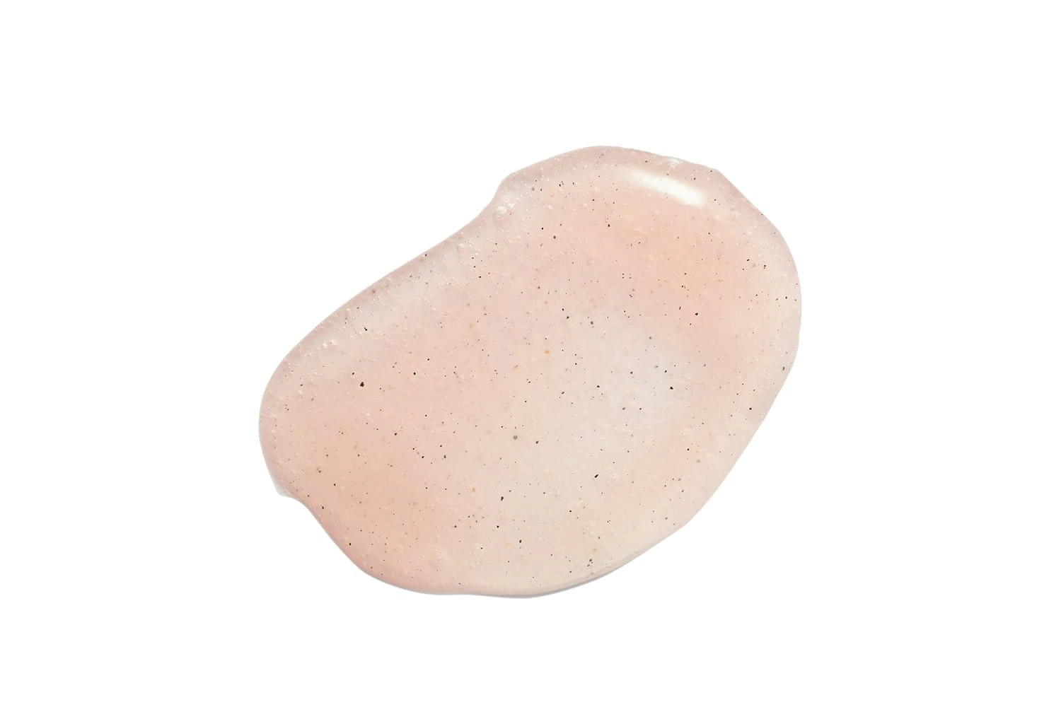 Pink texture of Rose Quartz Facial Polish on a white background for skin care.