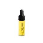 Le Prunier Plum Beauty Oil – klares Glasfläschchen mit schwarzer Pipettenkappe, gelbes Öl, weißer Hintergrund – Hautpflege