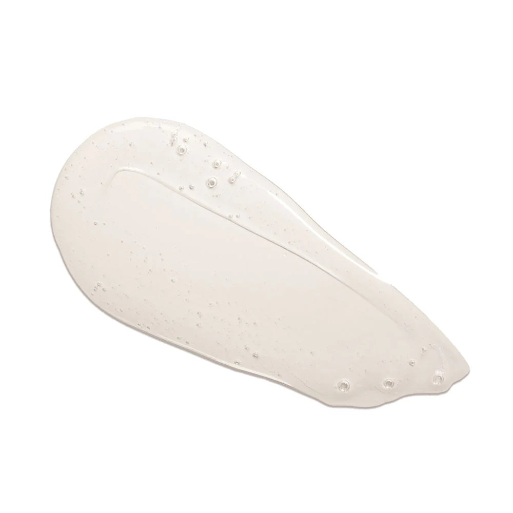 Awaken Body Wash – creamy texture with fine pearls, white background – body care