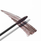Defining Mascara 02 Brown – brown mascara swipe with wand on white background – eye makeup