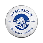 Rasierseife Sport – round metal lid with blue polar bear logo, white background – shaving care