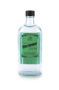 Nierle's Birken-Haarwasser – clear glass bottle with green label, black screw cap, white background – hair care