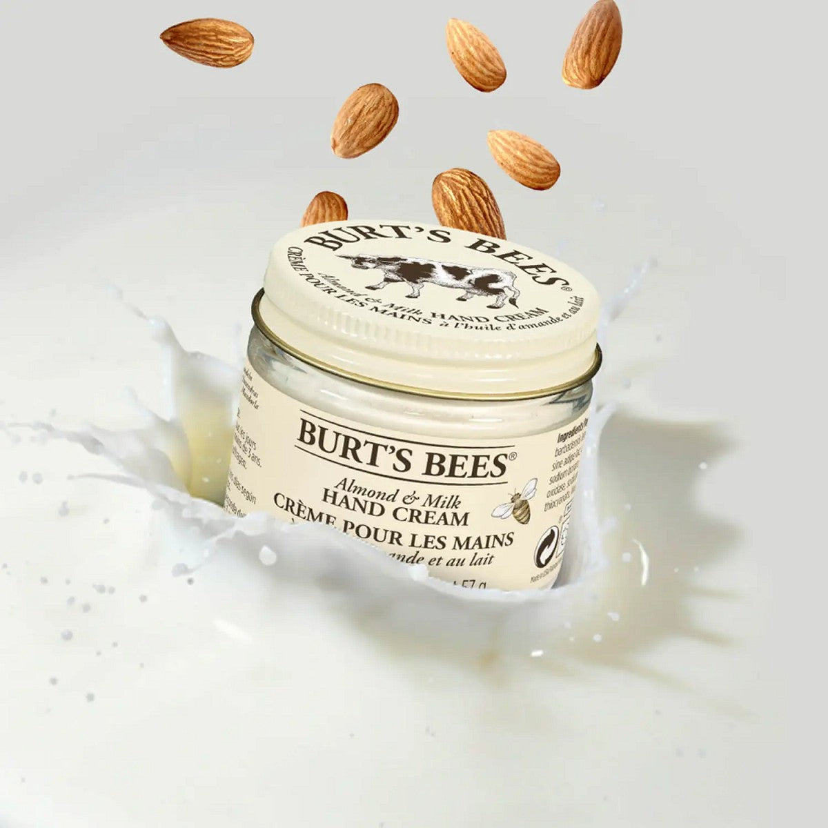 Burt’s Bees Almond & Milk Hand Cream – glass jar 57g, cream lid on white background – hand care