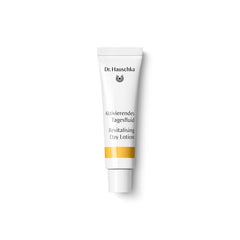 Dr. Hauschka Revitalising Day Lotion – white tube with gold-yellow stripe, white cap, white background – skin care