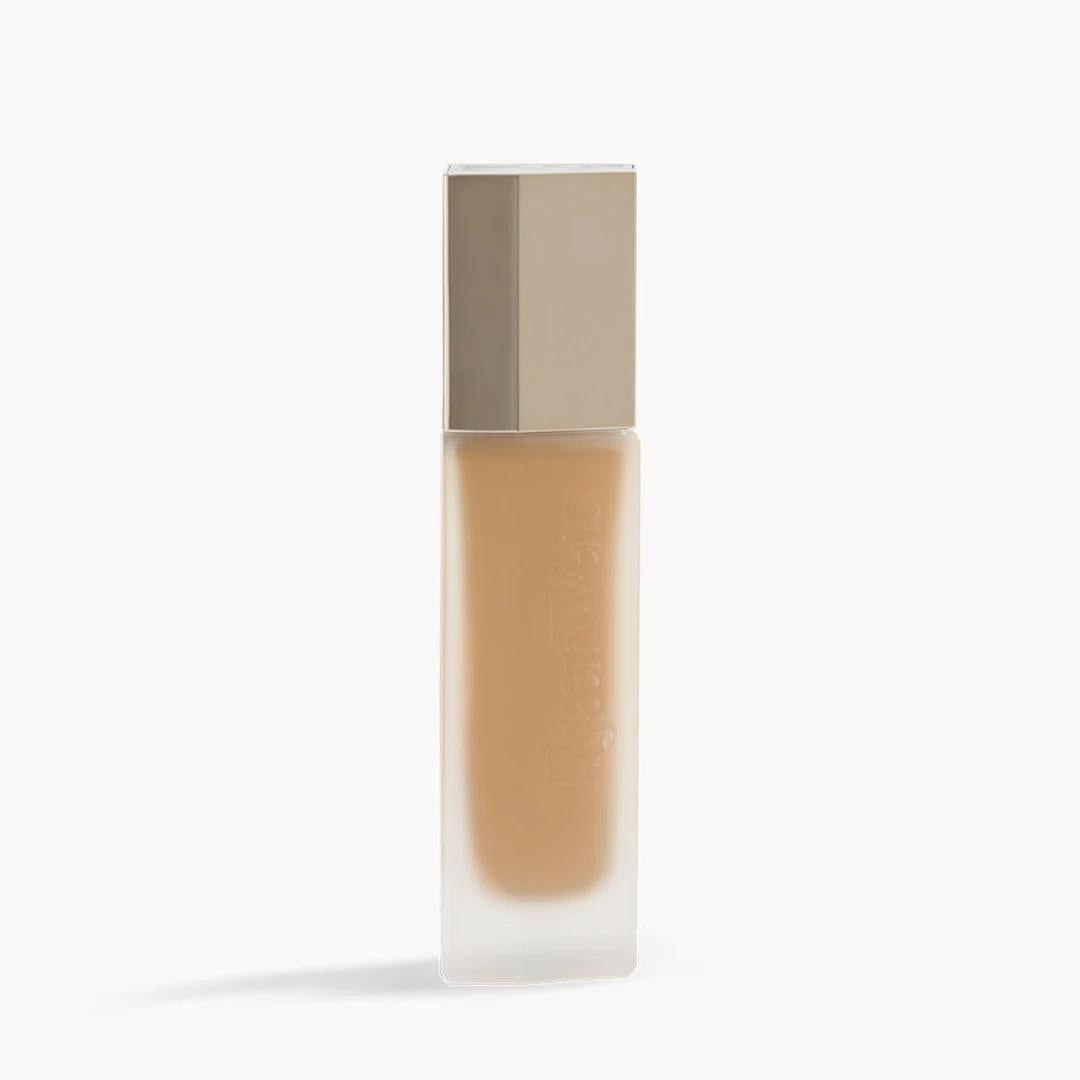 Stila Iconic Edition Packaging – 30ml bottle with metal cap, beige content, white background – makeup