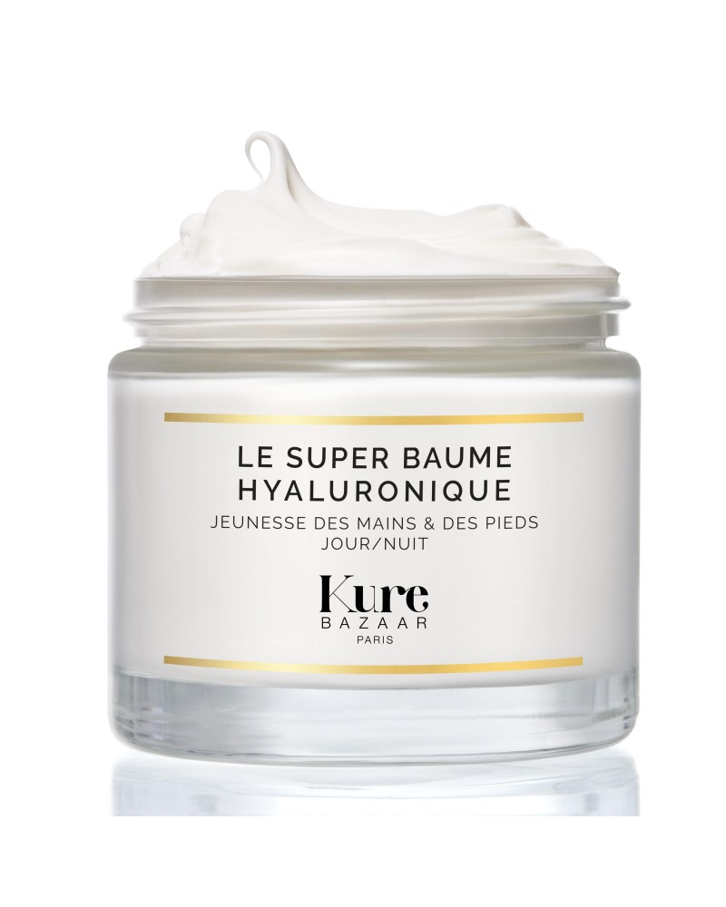 Kure Bazaar Le Super Baume Hyaluronique – clear glass jar, white cream, gold accents, white background – skin care