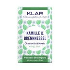 KLAR Solid Shampoo Chamomile & Nettle, 100g, green-white packaging with leaves and flowers – hair care
