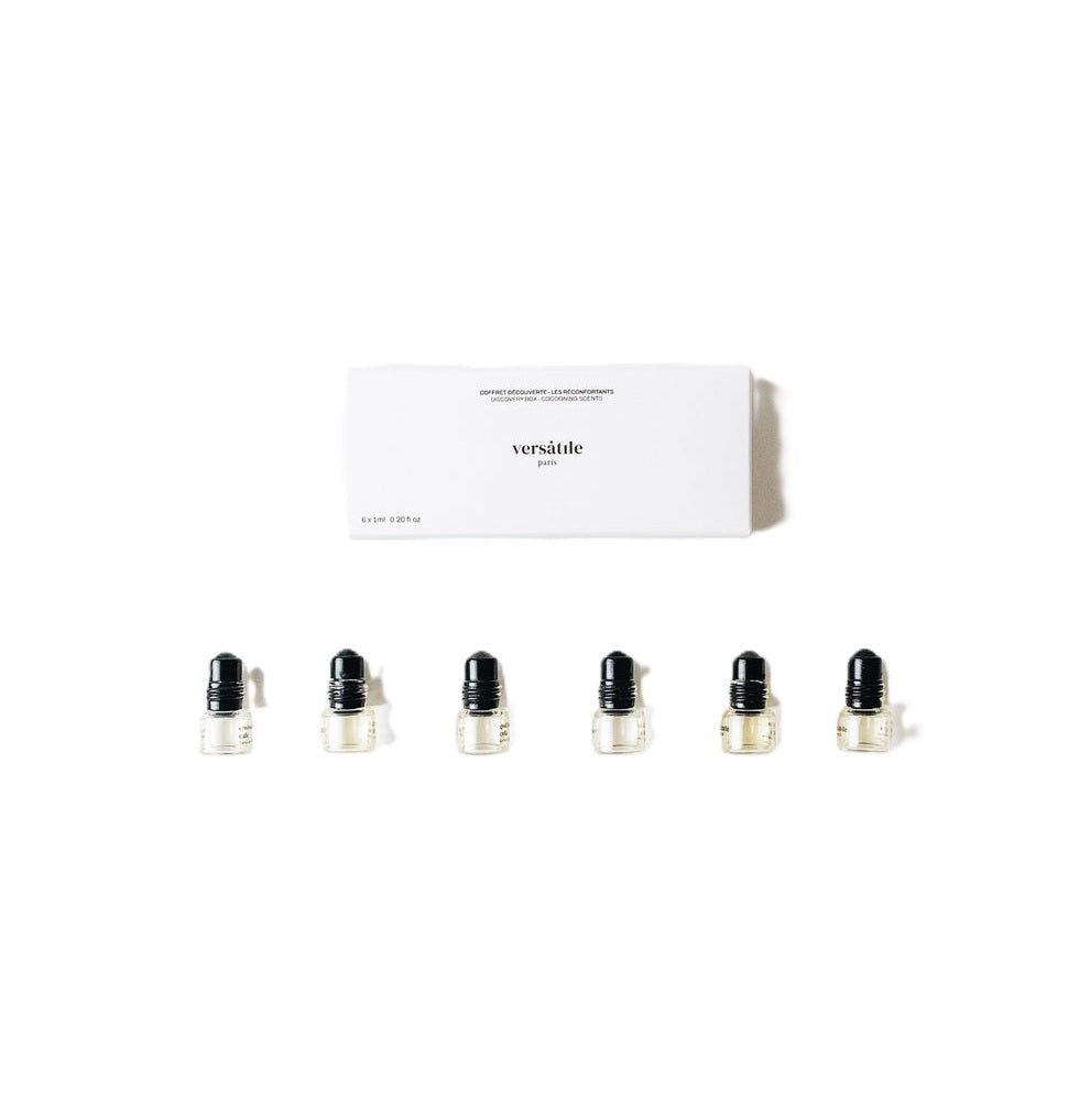 Versatile Paris Discovery Box Cocooning Scents: 6 small glass bottles with black caps on white background, fragrance.