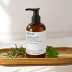 Evolve Pure Tranquility Hand & Body Lotion 250ml brown pump bottle on light background, skin care