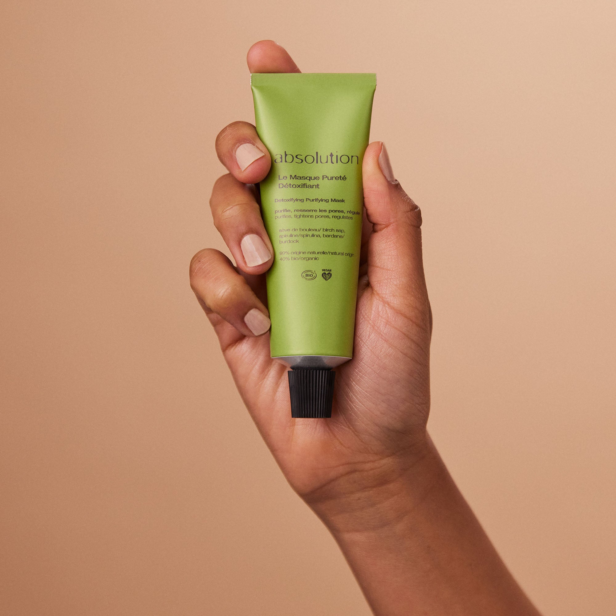 absolution Le Masque Pureté Detoxifiant – green tube with black cap, beige background – face mask