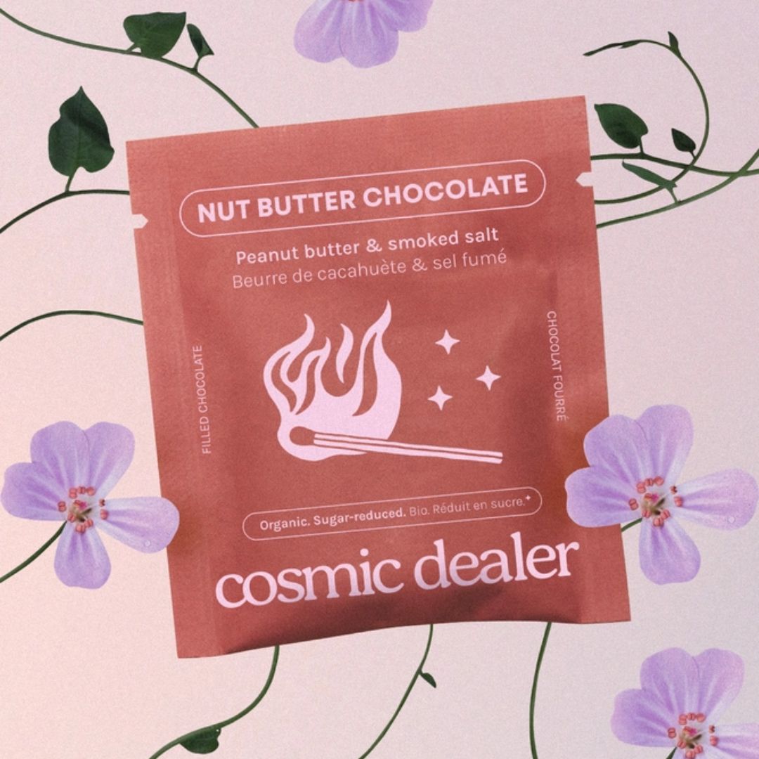 Cosmic Dealer Nut Butter Chocolate – brown single-serve pouch, purple floral background – chocolate
