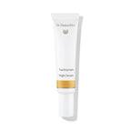 Dr. Hauschka Nachtserum – weiße Tube mit goldener Linie, weißem Verschluss, weißem Hintergrund – Hautpflege