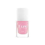 Rosa Nagellack von Kure Bazaar Paris in einer quadratischen Glasflasche mit weißem Verschluss.