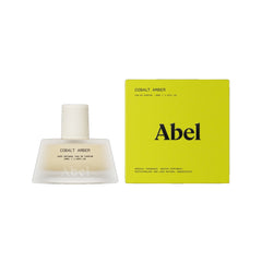 Abel Cobalt Amber Eau de Parfum – 50ml Glasflasche mit weißem Verschluss, gelbe Verpackung, weißer Hintergrund – Parfüm