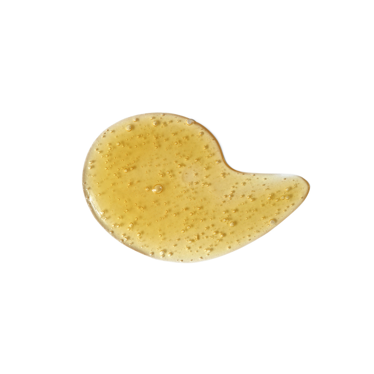 Gelbliche Textur des Peppermint Facial Wash auf weißem Hintergrund für die Hautpflege.