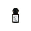 Versatile Paris Gueule de Bois Extrait de Parfum in a dark 30ml glass bottle with a spherical cap, fragrance