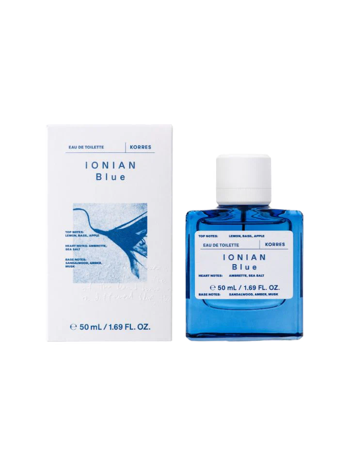 Korres Ionian Blue Eau de Toilette, blue spray bottle with white cap on white background, fragrance