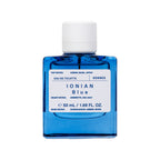 Korres Ionian Blue Eau de Toilette, 50ml blue glass bottle with white cap on white background, fragrance