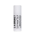 L:A Bruket No. 017 Lipbalm in a white tube with a white cap on a white background, lip care